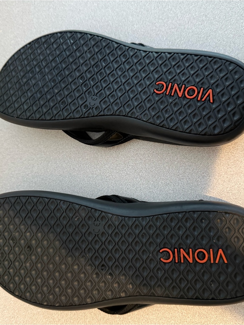 Vionic Black Flip Flops with Orange-Red Logo